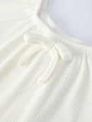 White Top And Daisy-Print Flared Pants Girl's Outfit