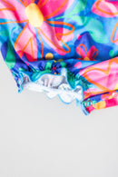 SALE Springing Around Ruffle Cross Back Romper