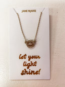 Andie Necklace – Gold Starburst Disc with Crystal Center (16" + 3" Ext)