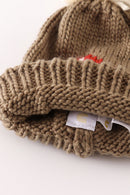 Brown pompom mushroom cable beanie hat