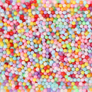 Fake rainbow nonpareil sprinkles