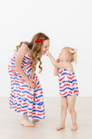 SALE July Vibes Ruffle Cross Back Romper