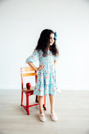 Honor Roll Smocked Ruffle Dress